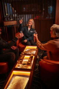 A whisky tasting event at Evolve Spirits Bar, guests analysing the different whiskies.